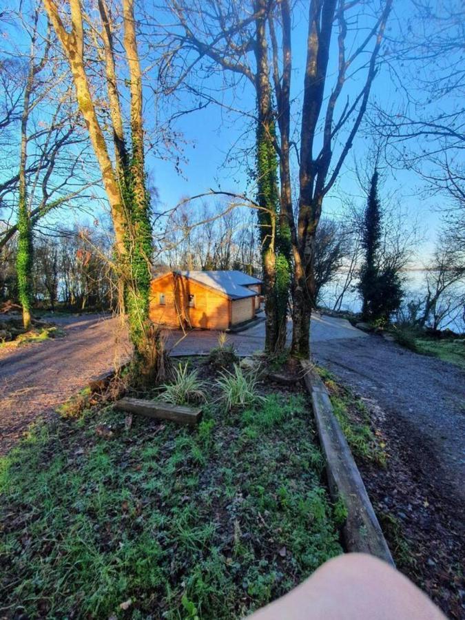 Вілла Stunning Log Cabin On The Lake Portroe Екстер'єр фото